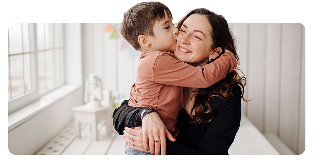 Mother and young child together, representing CHIP family health coverage